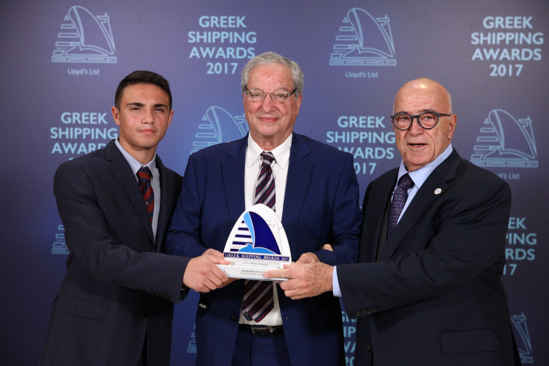 Dennis Vernardakis of Masters’ Shipping (centre) accepting the Shipbroker of the Year Award from Capt. Panagiotis Tsakos and Panagiotis Tsakos Junior of sponsor The Tsakos Group.