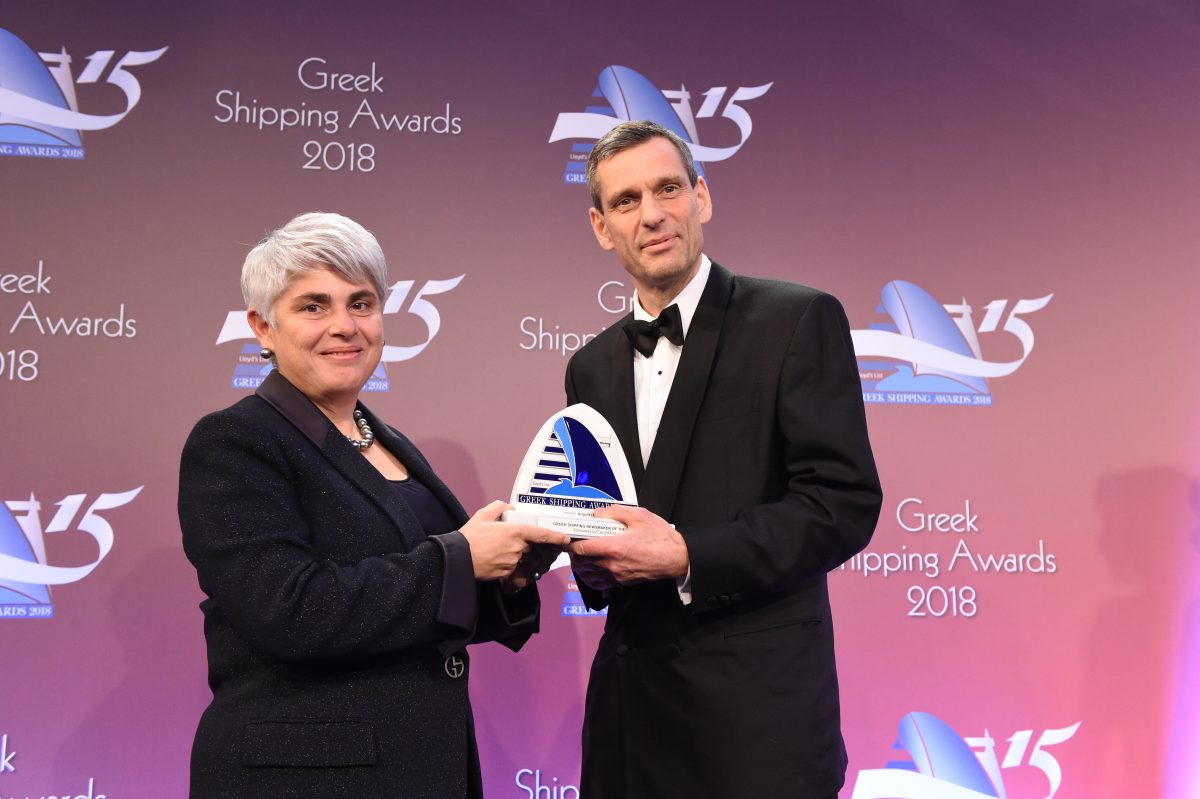 Angeliki Frangou accepting the Greek Shipping Newsmaker of the Year Award from Iain White of sponsor Exxon Mobil.