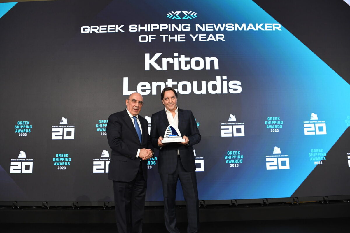 George Prassinos Med, UK & ME Marine Lubricants Manager of sponsor ExxonMobil, presenting the trophy to Kriton Lentoudis