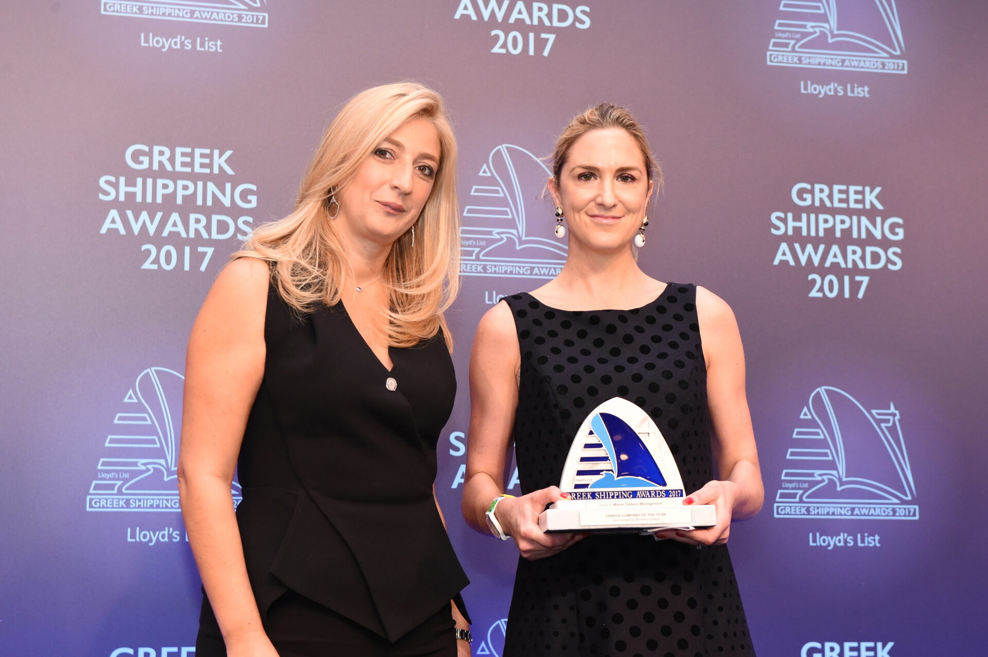 Paillette Palaiologou of sponsor Bureau Veritas presenting the Tanker Company of the Year Award to Dr. Maria Angelicoussis for Maran Tankers Management.