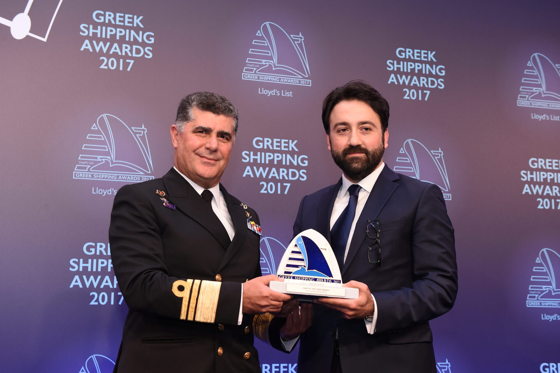 Chief of the Hellenic Navy General Staff, Vice Admiral Nikolaos Tsounis HN accepting the Ship of the Year Award for “Georgios Averof” from Taner Umac of sponsor RightShip.