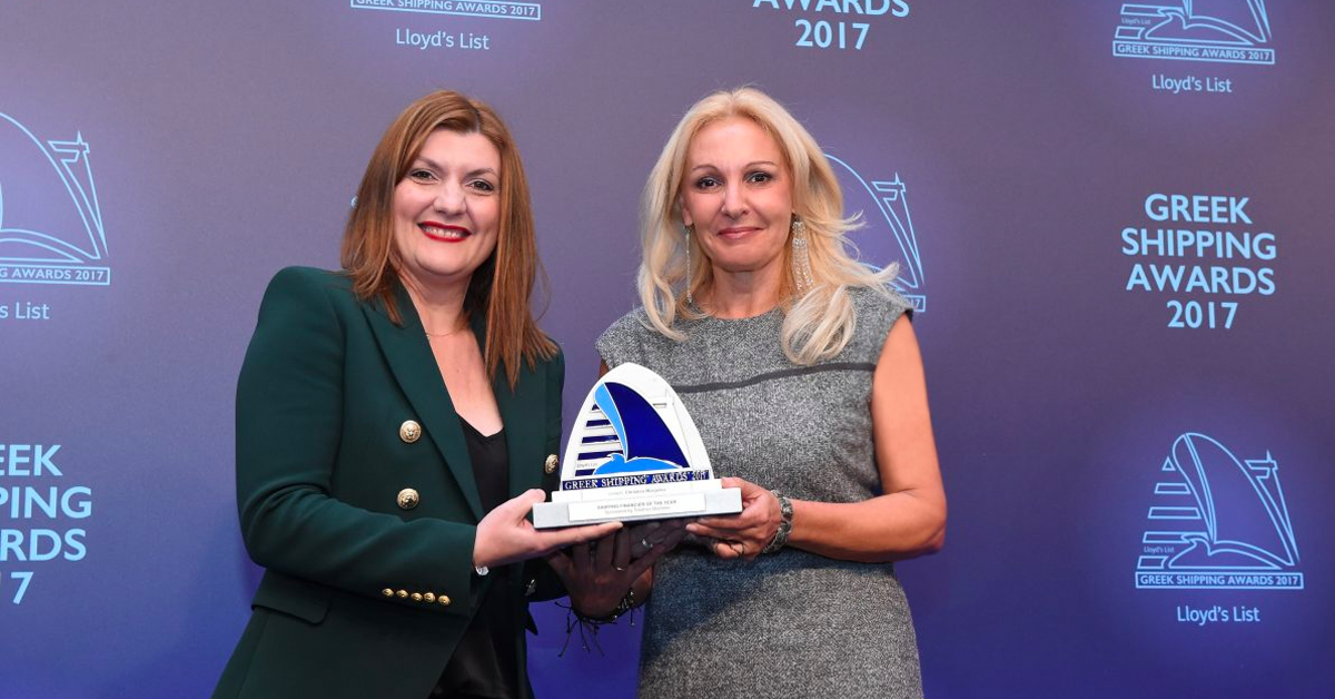 Despina Panayiotou-Theodosiou of sponsor Tototheo Maritime presenting the Shipping Financier of the Year Award to Christina Margelou of Eurobank.