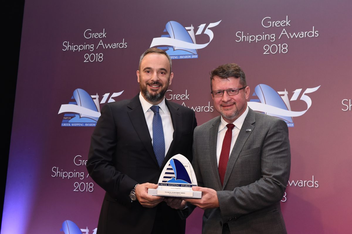 Kostas Fanouriadis of Farad S.A. accepting the Technical Achievement Award from Ioannis Chiotopoulos of sponsor DNV GL.
